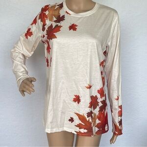 Fall themed cream, orange, and brown leaves print long sleeve top